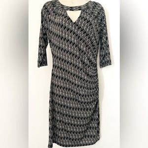 This dress is from Miss Tina by Tina Knowles, Polyester and Spandex blend in M